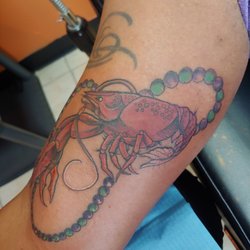 Color Bomb Tattoo and Body Piercing