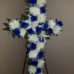 Vicky's Flowers - Blue Rose cross funeral arrangement