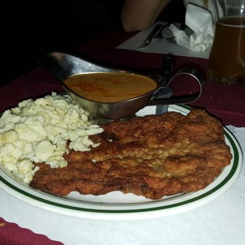 The Hub German Restaurant & Lounge - Breaded schintzel and spaetzel served with paprika gravy! - German Near Me - St. Robert, Missouri