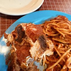 Umberto's Pizza & Pasta - The burnt chicken Parmigiana  with no flavor at all