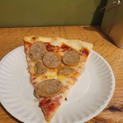 Joe’s Pizza - Slice of sausage pizza