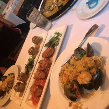 Spain Restaurant - Paella Valenciana, Stuffed Artichoke Hearts and Beef Empanadillas ( baby had a binky lol) - Spanish Near Me - Cranston, Rhode Island