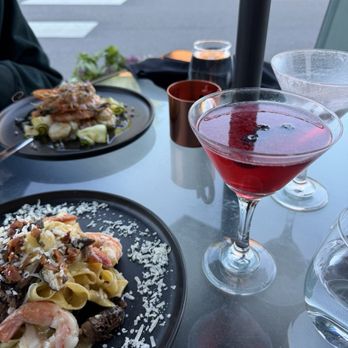 The District Bistro - Outdoor dining; beautiful blueberry & huckleberry martini - Beer, Wine & Spirits Near Me - Sandpoint, Idaho The District Bistro - Outdoor dining; beautiful blueberry & huckleberry martini - Beer, Wine & Spirits Near Me - Sandpoint, Idaho