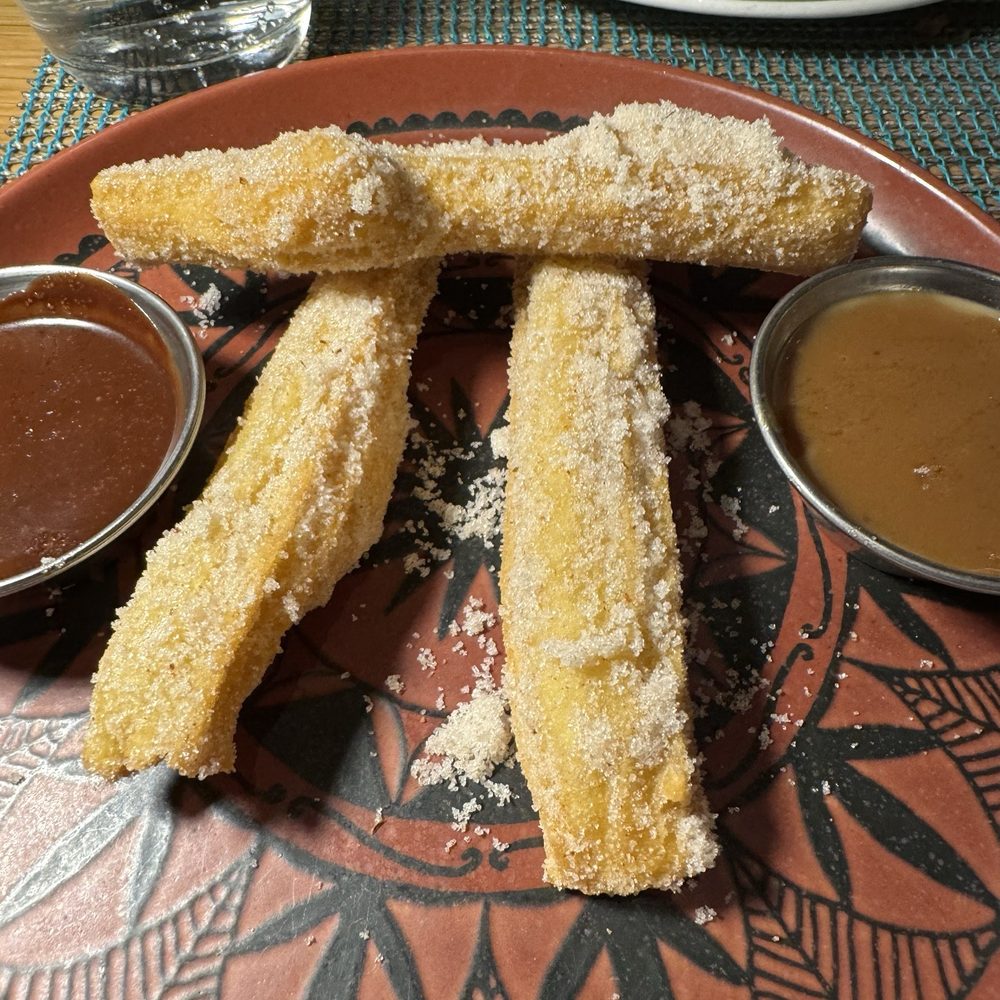 Bocanova - Churro Dessert Option. Crispy light and comes w chocolate and caramel sauces. - Latin American Near Me - Oakland, California Bocanova - Churro Dessert Option. Crispy light and comes w chocolate and caramel sauces. - Latin American Near Me - Oakland, California