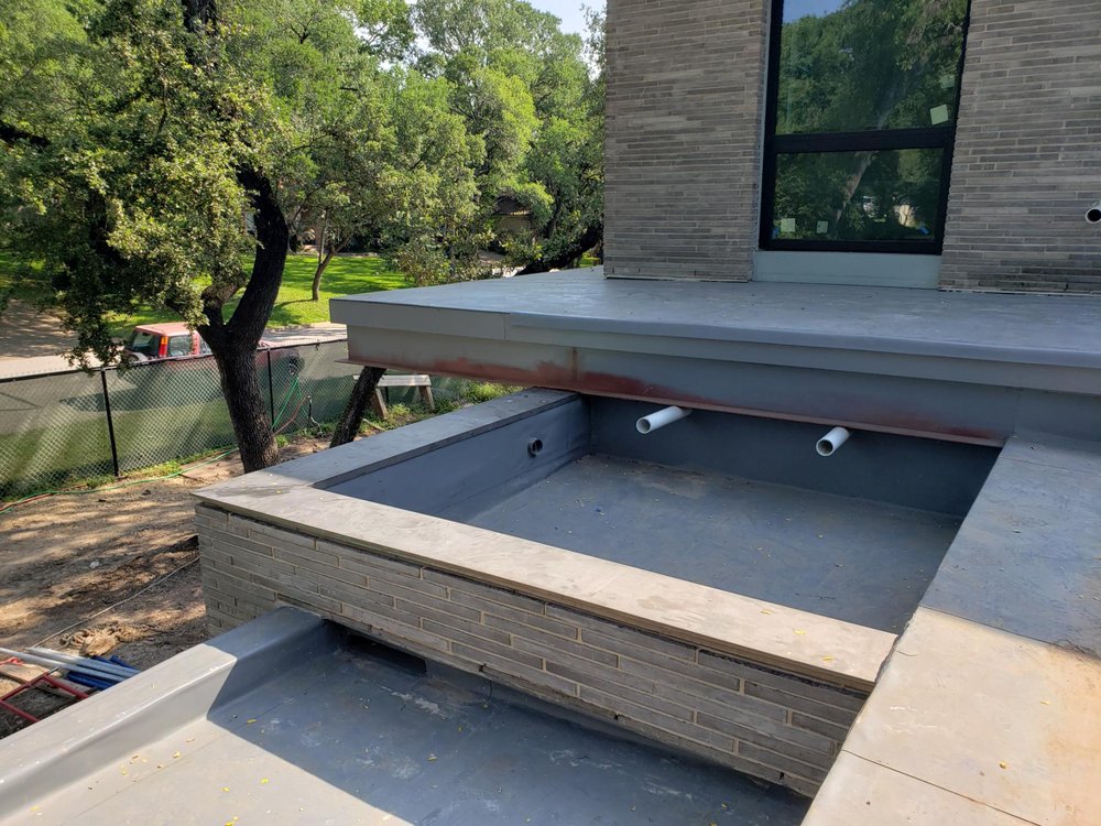 Slide of Armadillo Roofing & Exteriors