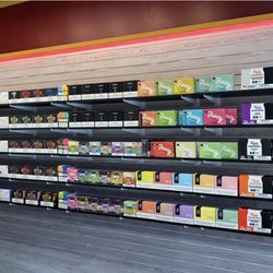 Invictus Vape & Smokeshop - Wall full of disposables