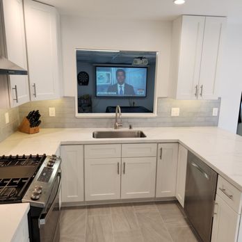 Xpress Kitchen & Bath - Washing dishes and keeping up on the news! - General Contractors Near Me - Redwood City, California Xpress Kitchen & Bath - Washing dishes and keeping up on the news! - General Contractors Near Me - Redwood City, California
