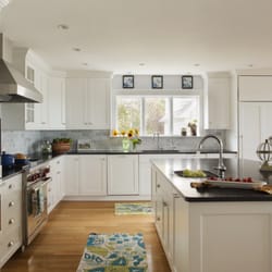 Heartwood Kitchens - A big kitchen island makes cooking and entertaining easier.