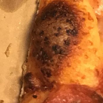 Domino's Pizza - Burned crust I went and looked at Dominos website and I did not see any of the pictures of the pizza on the website look like this - Pizza Near Me - Leesville, Louisiana
