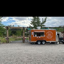Sandos and Sandias - Sandos Sandias food truck and entrance to a the Corral