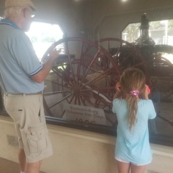 PIONEER MUSEUM - Fascinated 7 year old learning how they put out fires in pioneer days. - Museums Near Me - Fredericksburg, Texas PIONEER MUSEUM - Fascinated 7 year old learning how they put out fires in pioneer days. - Museums Near Me - Fredericksburg, Texas