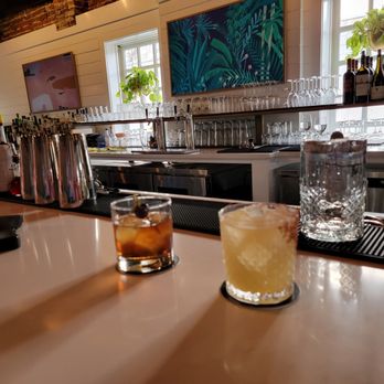 The Walk Up - a bar with two glasses of alcohol - Cocktail Bars Near Me - Cary, North Carolina The Walk Up - a bar with two glasses of alcohol - Cocktail Bars Near Me - Cary, North Carolina