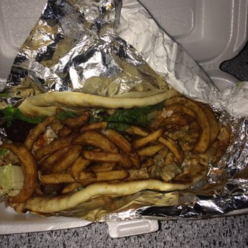 New York Eats - Gyro Chicken and Falafel Mix Wrap with curly fries - Mediterranean Near Me - Arlington, Texas New York Eats - Gyro Chicken and Falafel Mix Wrap with curly fries - Mediterranean Near Me - Arlington, Texas