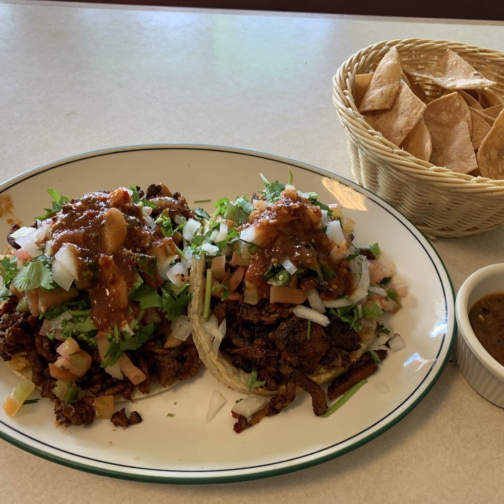 Soft tacos Al pastor everything on it. Chips and salsa