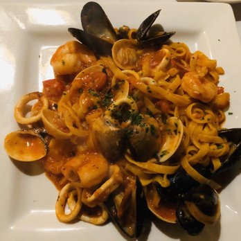 Mezza Luna - Fettuccine alla Pescatora with red wine - Italian Near Me - Smyrna, Georgia Mezza Luna - Fettuccine alla Pescatora with red wine - Italian Near Me - Smyrna, Georgia