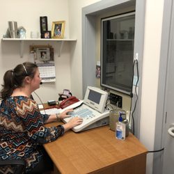 Michael A Seicshnaydre MD FACS Faaoa - Audiologists performs hearing tests on sight in office