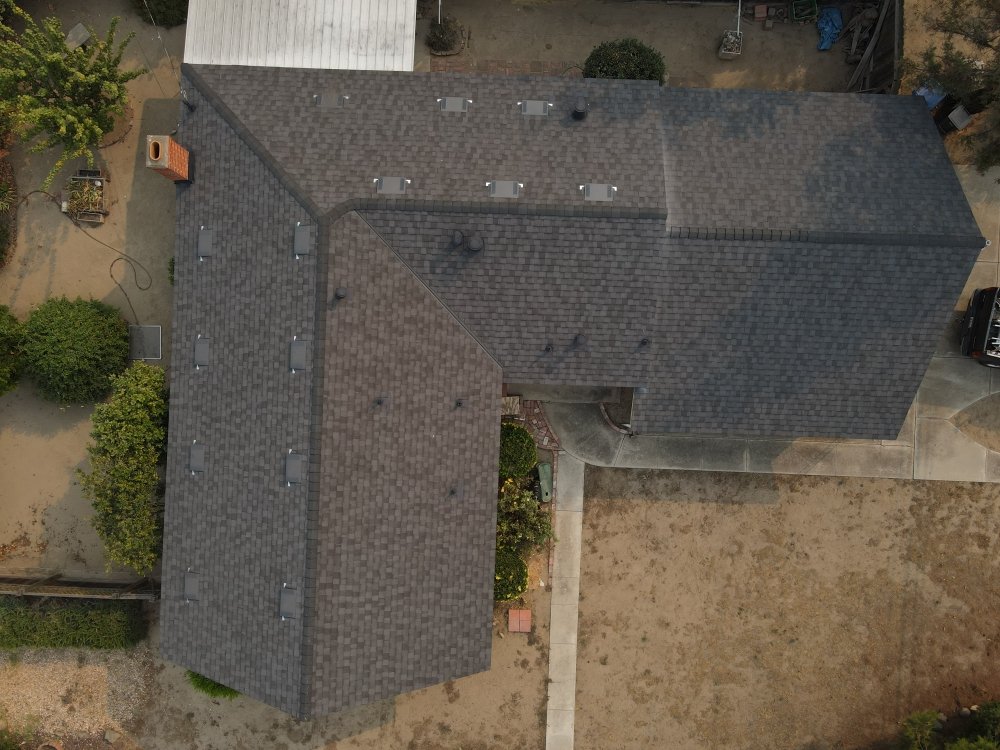 Slide of Real Roofing
