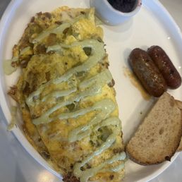 Santa Fe Omelet with a side of sausage and sourdough