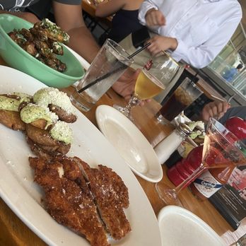 Doc B's Restaurant + Bar - Crispy Jalapeno Potatoes with side of fried chicken breast, that's my go to. - New American Near Me - Austin, Texas