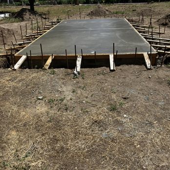 Smith Builders - a concrete slab being poured - General Contractors Near Me - West Jordan, Utah Smith Builders - a concrete slab being poured - General Contractors Near Me - West Jordan, Utah