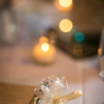 Alethea's Chocolates - Gold foil-wrapped kiss with cream-colored ribbon (you can bring your own if you want or pick from their assorted colors!) - Desserts Near Me - Williamsville, New York