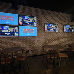 The Draft Sports Bar & Grill - TVs along the walls
