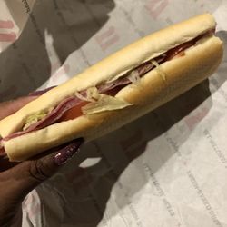 Jimmy John's - It's so tiny, I can barely hold it. No ingredients at all !