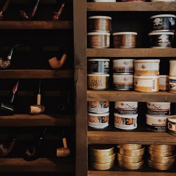 Spring Street Cigars - shelves of tobacco and tobacco pipes - Cigar Bars Near Me - Oxford, Mississippi Spring Street Cigars - shelves of tobacco and tobacco pipes - Cigar Bars Near Me - Oxford, Mississippi