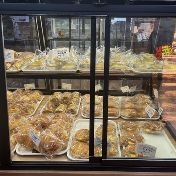 Double Rainbow Bakery - a display case full of pastries - Bakeries Near Me - Elmhurst, New York