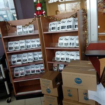 Omar Coffee Company - shelves of coffee in a coffee shop - Coffee & Tea Near Me - Newington, Connecticut Omar Coffee Company - shelves of coffee in a coffee shop - Coffee & Tea Near Me - Newington, Connecticut