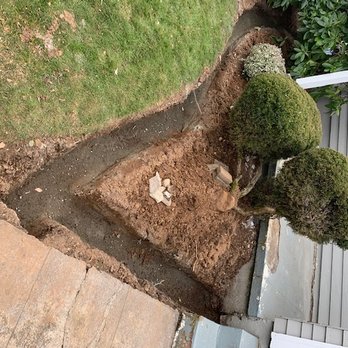 M Leon Construction - Trenched around landscaping and under walkway. - Waterproofing Near Me M Leon Construction - Trenched around landscaping and under walkway. - Waterproofing Near Me