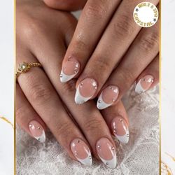 Crystal Nails & Spa - Classic French with a Touch of Sparkle Timeless French tips paired with delicate rhinestone accents for the perfect elegant look. Simpl