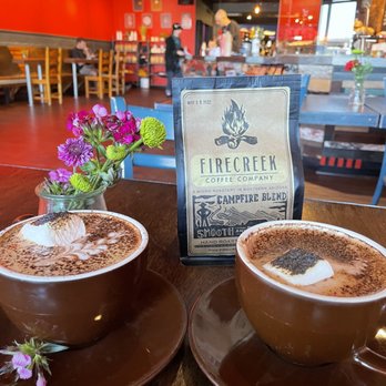 Firecreek Coffee - Campfire- s'mores cupped. Absolutely delicious. Left cup made with with whole milk and right cup made with oat milk. - Coffee & Tea Near Me - Flagstaff, Arizona