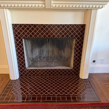 Fireclay Tile - The Fireclay tile (Tiger's Eye) on the hearth and the face of the fireplace was set by Fireclay Tile's team Everson and Johnny. It is exact. - Flooring Near Me - San Francisco, California