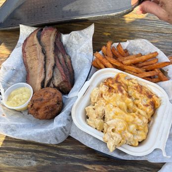 Low & Slow BBQ - a person holding a tray of food - Barbeque Near Me - Blue Lake, California Low & Slow BBQ - a person holding a tray of food - Barbeque Near Me - Blue Lake, California