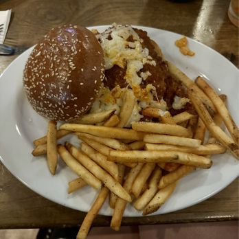 Rusty Bucket Restaurant & Tavern - Buffalo Chicken Sandwich with French Fries - American Near Me - Liberty Township, Ohio Rusty Bucket Restaurant & Tavern - Buffalo Chicken Sandwich with French Fries - American Near Me - Liberty Township, Ohio