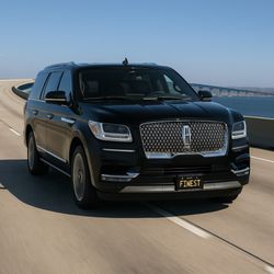 "Cruising the Coronado Bridge in our new Premium Class Lincoln Navigator. Ride in style with Finest City Transportation."