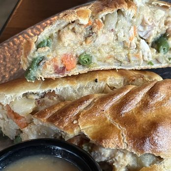 Cornish Pasty - Side cut of comfort food- chicken pot pie pasty - Pubs Near Me - Phoenix, Arizona