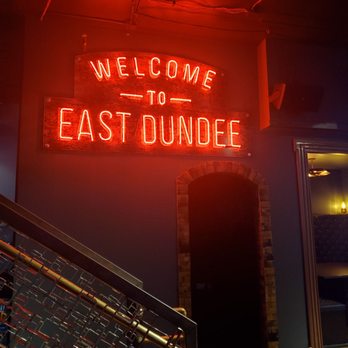 D.C. Cobb's - a neon sign that reads welcome to east dundee - Burgers Near Me - East Dundee, Illinois