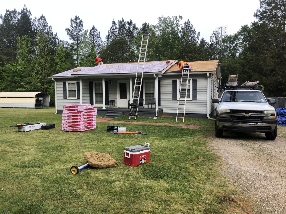 Slide of Ray's Roofing & Restoration