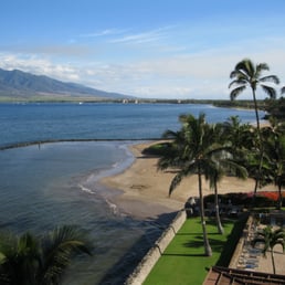 The view north with the pool and mini-beach. The view north with the pool and mini-beach.