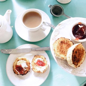 The Muffin Man Tea Shop - Devon Cream Tea with cones, jam, and cream. Tea with a splash of milk. - Coffee & Tea Near Me - London, XGL The Muffin Man Tea Shop - Devon Cream Tea with cones, jam, and cream. Tea with a splash of milk. - Coffee & Tea Near Me - London, XGL