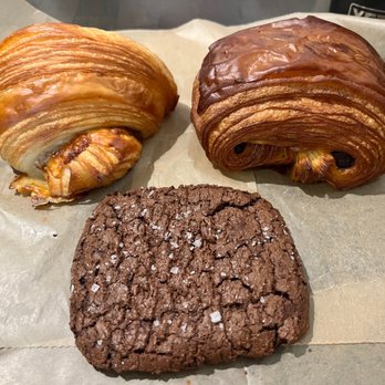 Dan the Baker - Ham & Gruyère croissant (upper left), chocolate croissant (upper right), and chocolate rye cookie - Bakeries Near Me - Columbus, Ohio Dan the Baker - Ham & Gruyère croissant (upper left), chocolate croissant (upper right), and chocolate rye cookie - Bakeries Near Me - Columbus, Ohio