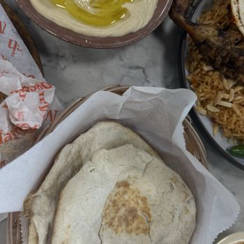 Maroush Food - Hummus with pita bread - Mediterranean Near Me - Orlando, Florida Maroush Food - Hummus with pita bread - Mediterranean Near Me - Orlando, Florida