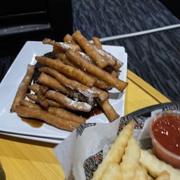 Funnel cake fries. If you looked closely, you'll see Robert Brownie Jr. hiding underneath