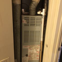 Broadacres Apartments - Moldy a/c unit repaired with mechanic paper towels.
