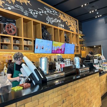 Starbucks - a woman behind the counter of a coffee shop - Coffee & Tea Near Me - Austin, Texas Starbucks - a woman behind the counter of a coffee shop - Coffee & Tea Near Me - Austin, Texas