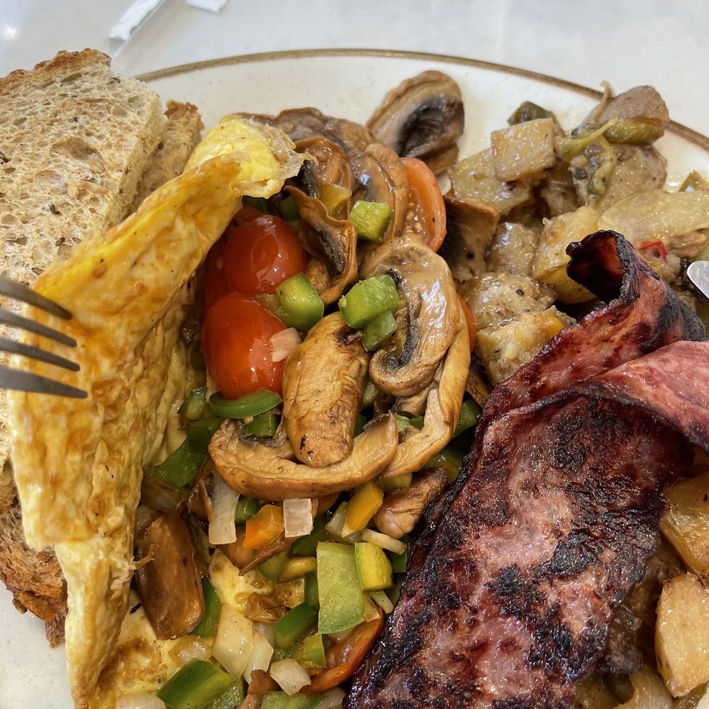 Gussy's Cafe - Garden Vegetable Omelette (a peak inside) - Breakfast & Brunch Near Me - Jersey City, New Jersey Gussy's Cafe - Garden Vegetable Omelette (a peak inside) - Breakfast & Brunch Near Me - Jersey City, New Jersey