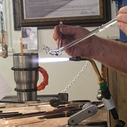 Sparky's Glassblowing - Live Glass Blowing in shop: a Bear Tree(that's the root).