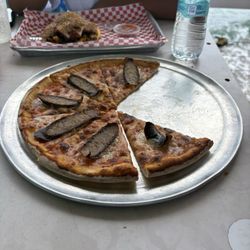 Sunset Beach Bar & Grill - Round Trip Pizza was tasty. Thin and crisp.